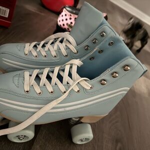 Light Blue Roller Skates with White Laces